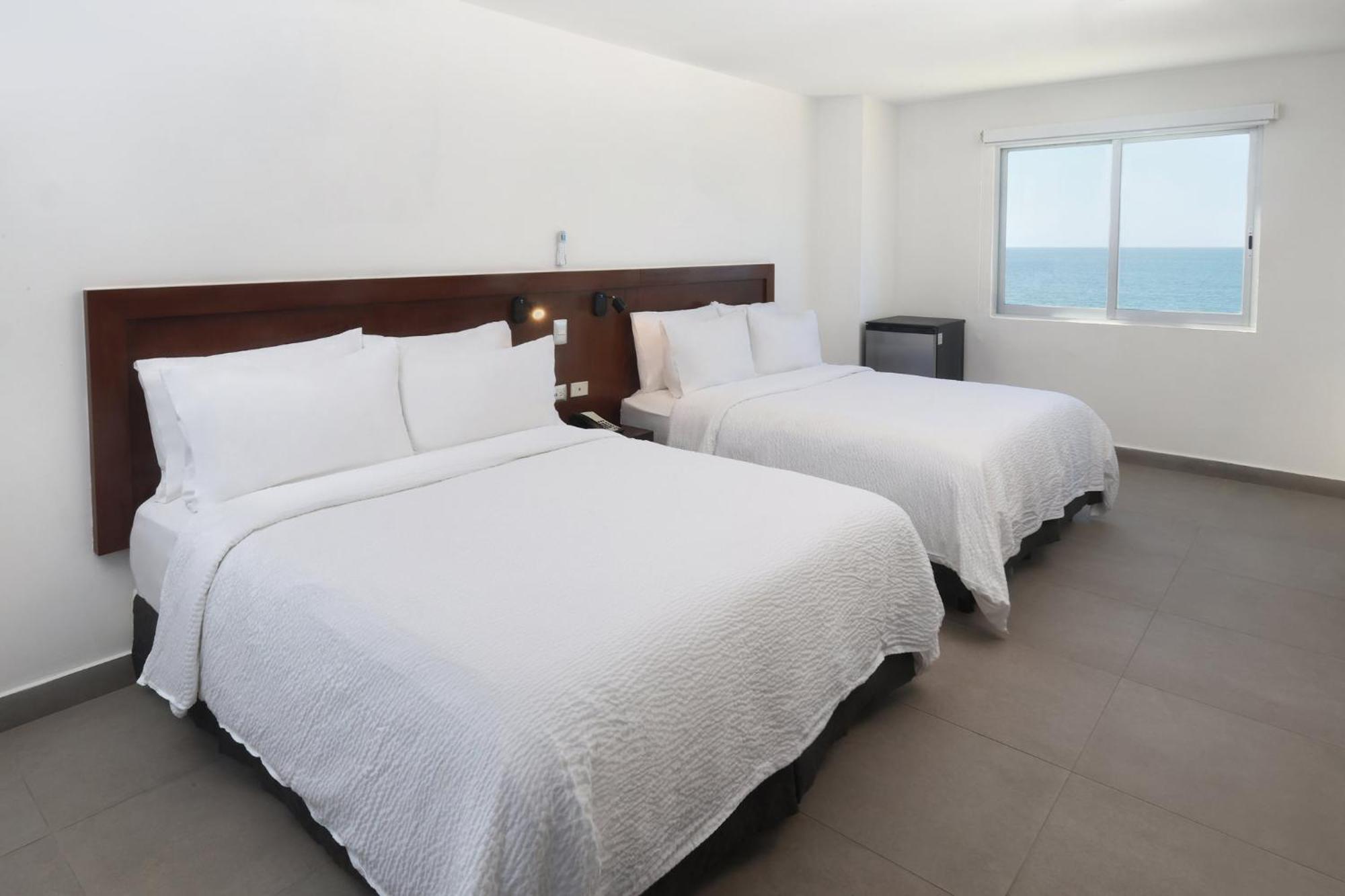 Two-Bedroom Suite with Four Queen Beds and Ocean Front