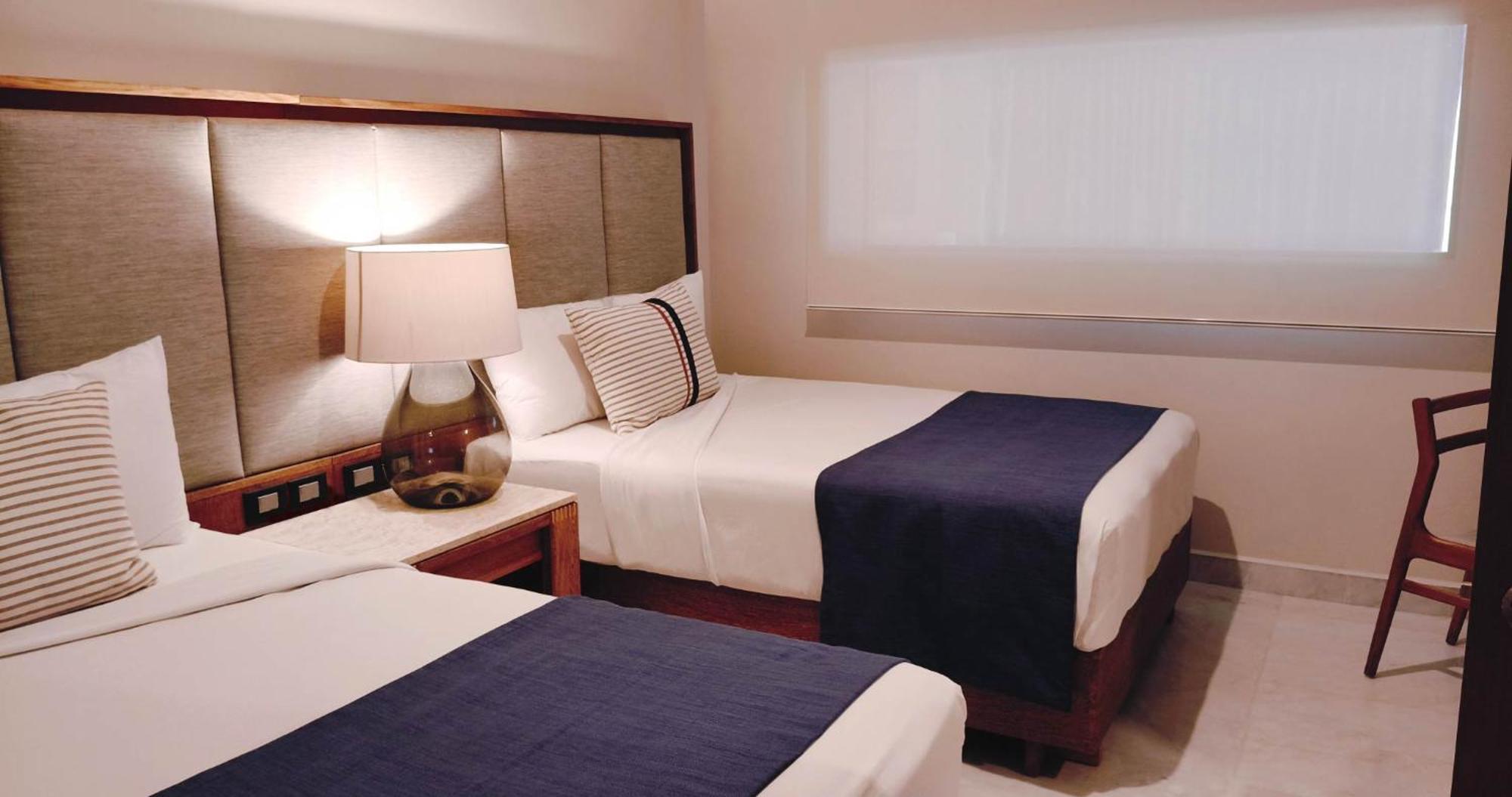 Suite Superior con 2 camas dobles